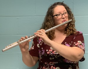 orchestra member playing the flute
